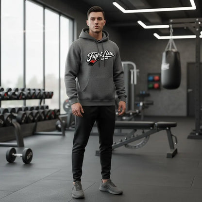 Male model wearing gray hoodie front pose styled with joggers